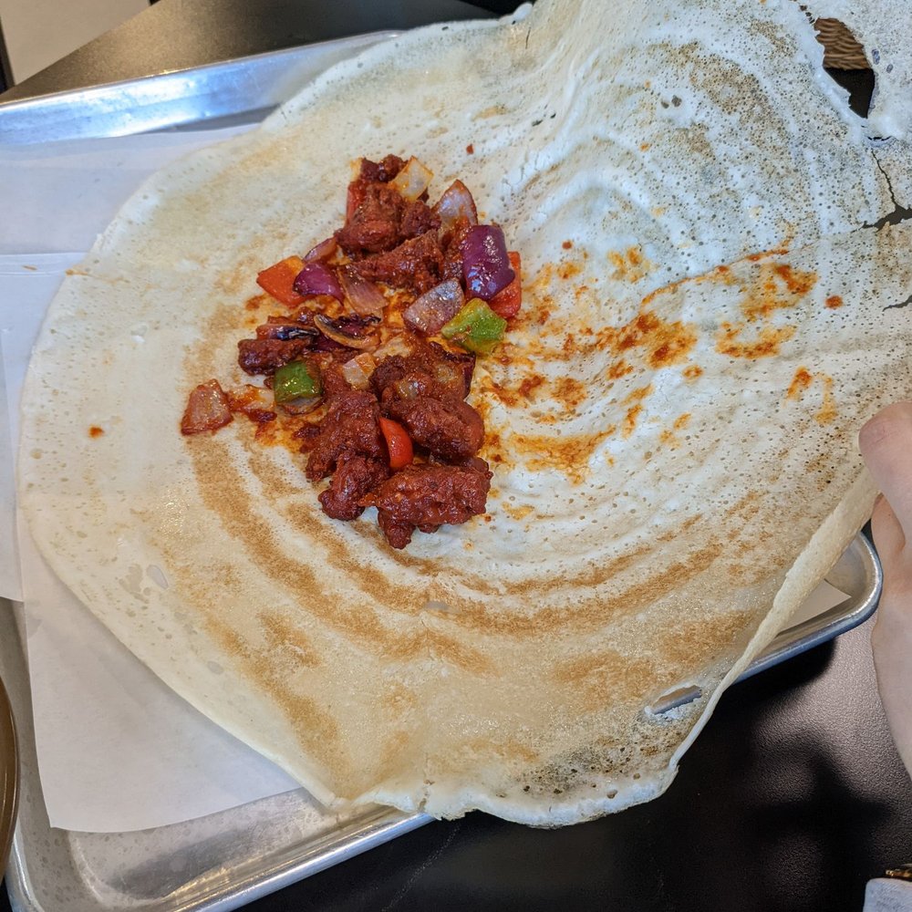Dosa Boyz - Rajini chicken dosa (opened so you can see the inside) - Indian Near Me - Mississauga, Ontario Dosa Boyz - Rajini chicken dosa (opened so you can see the inside) - Indian Near Me - Mississauga, Ontario