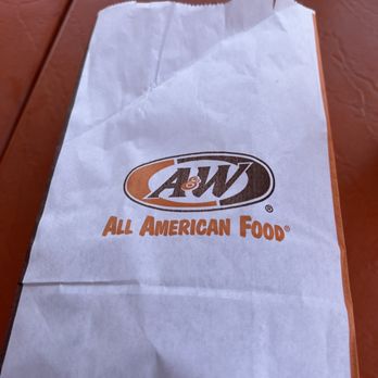 A&W Restaurant - a bag of food on a table - Burgers Near Me - Berkley, Michigan A&W Restaurant - a bag of food on a table - Burgers Near Me - Berkley, Michigan