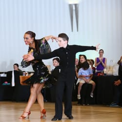Maestro Dance Academy - Pro-Am Latin dance competition. Patricia dancing with the student Colin Logan the Cha Cha