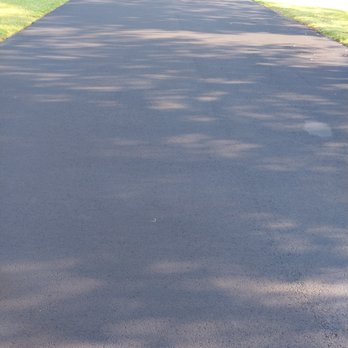 Cfn Paving & Sealcoating - Driveway sealcoat view from garage toward road. - Masonry/Concrete Near Me