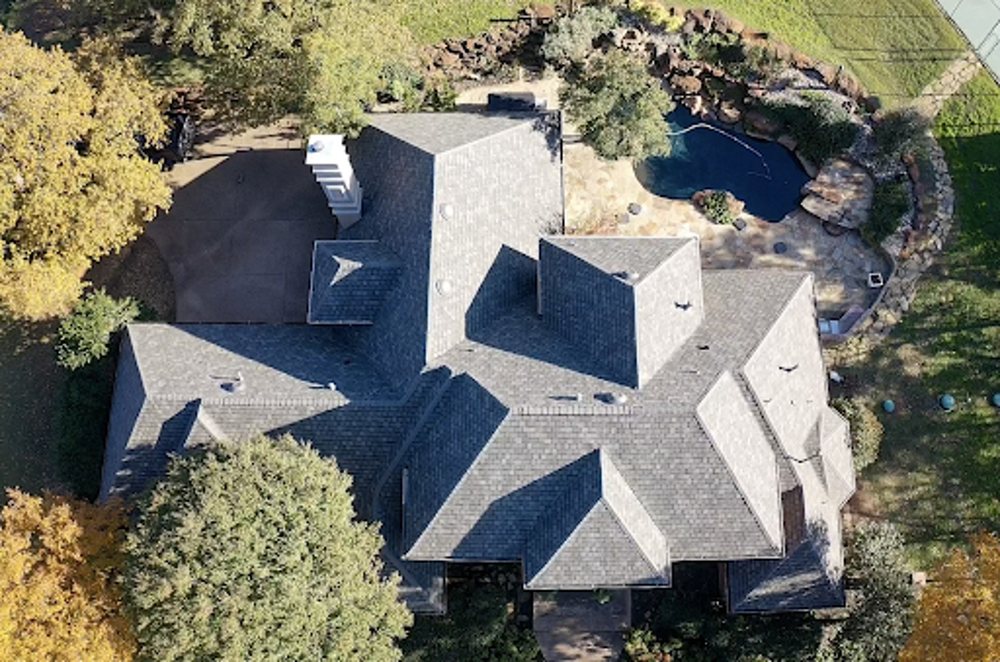 Slide of Status Roofing