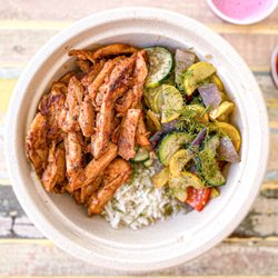 Sumac - Organic Chicken Rice Bowl.  Comes with sumac yogurt sauce and hot sauce.
