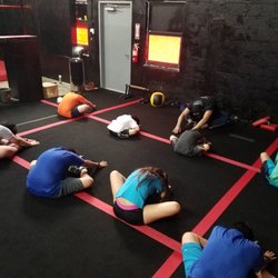 305 Ninja Academy - 8-12 Year old members warming up