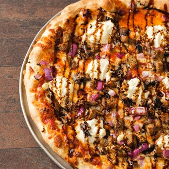 Oblio's Pizzeria - a pizza on a pan - Pizza Near Me - Denver, Colorado
