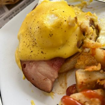 Susie Q's - Eggs Benedict with home fries. - Breakfast & Brunch Near Me - Port Saint Lucie, Florida Susie Q's - Eggs Benedict with home fries. - Breakfast & Brunch Near Me - Port Saint Lucie, Florida