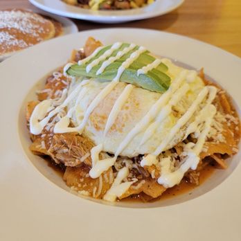The Churro Waffle - Chilaquiles Rojos with Carnitas - Breakfast & Brunch Near Me - Chicago, Illinois The Churro Waffle - Chilaquiles Rojos with Carnitas - Breakfast & Brunch Near Me - Chicago, Illinois