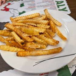 Juliano's Restaurant & Pizzeria - Splitting a Large Fry...crunchy and the flavor is old school fryer action.