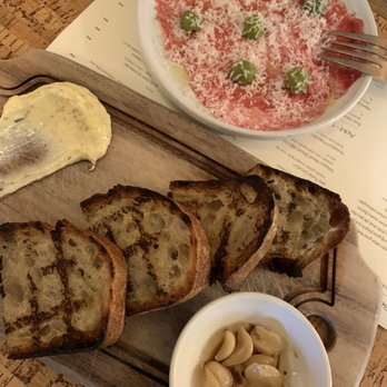 How to Cook a Wolf - sourdough & beef carpaccio - Italian Near Me - Seattle, Washington
