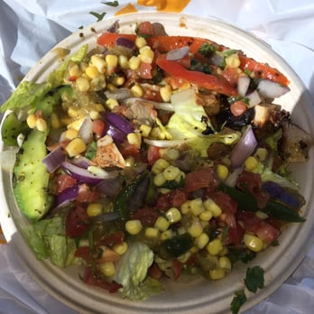 Qdoba Mexican Eats - Salad with chicken, peppers and onions, corn, and tomatillo salsa. The portion of chicken was skimpy and quality sucked. - Mexican Near Me - Fresh Meadows, New York