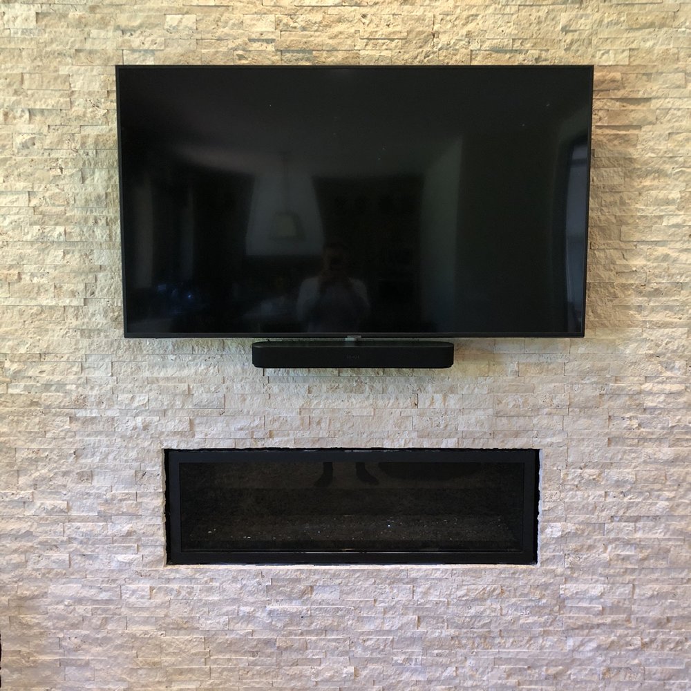 The Flatscreenguru - Flat TV and sound bar installed over veer chimney wall - Home Theatre Installation Near Me The Flatscreenguru - Flat TV and sound bar installed over veer chimney wall - Home Theatre Installation Near Me