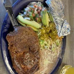 Carne asada. Steak, beans, rice, avocado, lettuce medley/mix Carne asada. Steak, beans, rice, avocado, lettuce medley/mix