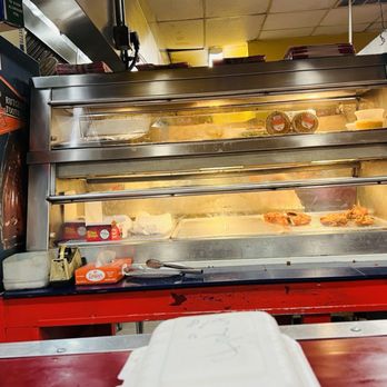 Crown Fish & Chicken - a counter with food items - Chicken Wings Near Me - Piscataway Township, New Jersey
