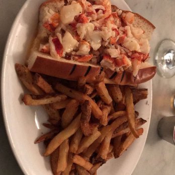 Neptune Oyster - Warm lobster roll tossed in butter - Seafood Near Me - Boston, Massachusetts Neptune Oyster - Warm lobster roll tossed in butter - Seafood Near Me - Boston, Massachusetts