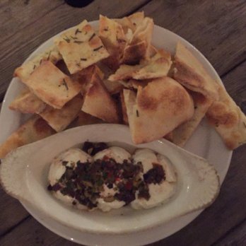 Fralo's - FROMAGGIO DI CAPRA Baked Goat Cheese, Olive Tapenade, Herbed Focaccia - Pizza Near Me - San Antonio, Texas Fralo's - FROMAGGIO DI CAPRA Baked Goat Cheese, Olive Tapenade, Herbed Focaccia - Pizza Near Me - San Antonio, Texas