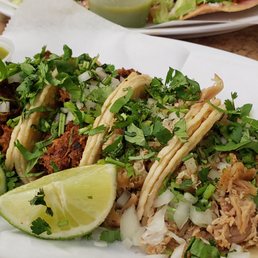 4 Tacos, Marinated Beef and Chicken - $2 bucks each. 4 Tacos, Marinated Beef and Chicken - $2 bucks each.