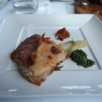 Pilu at Freshwater - Oven roasted suckling pig, served on the bone with condiments - Italian Near Me - Freshwater, NSW