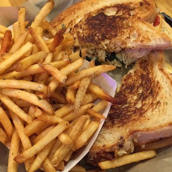 Toasted - UCF Area - As Gouda As it Gets grilled cheese with their delicious truffle oil fries! - Burgers Near Me - Orlando, Florida
