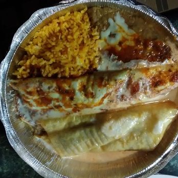 Las Ollas Mexican Restaurant - Burrito and chimichanga with rice and beans - Mexican Near Me - Christopher, Illinois Las Ollas Mexican Restaurant - Burrito and chimichanga with rice and beans - Mexican Near Me - Christopher, Illinois