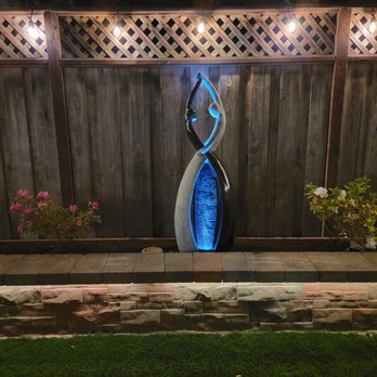JL Gardening - Fountain in evening - Gardeners Near Me JL Gardening - Fountain in evening - Gardeners Near Me