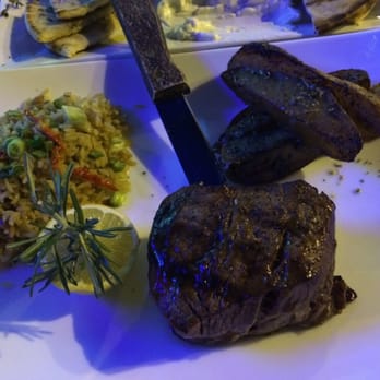 Poseidon - Filet mignon with rice pilaf. - Greek Near Me - Miami Beach, Florida Poseidon - Filet mignon with rice pilaf. - Greek Near Me - Miami Beach, Florida