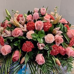 Poppy's Flower and Gift Shop - Rose and Tulip Casket Spray
