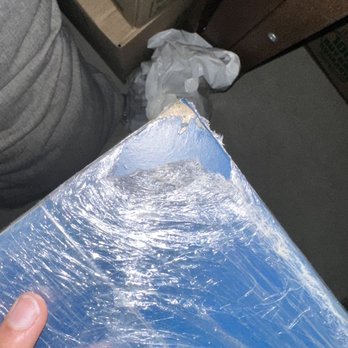 Grizzly Moving & Storage - Scratches on all four corners of the drawer from being dragged on the floor. - Movers Near Me - San Diego, California