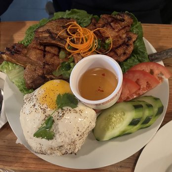 District Saigon - Pork Chop with fried egg & rice! Grilled lemon grass. - Vietnamese Near Me - Astoria, New York District Saigon - Pork Chop with fried egg & rice! Grilled lemon grass. - Vietnamese Near Me - Astoria, New York