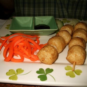 The Monkey Bridge - Ca Vien Ghim - skewered fish balls fried golden served with sweet plum sauce. - Vietnamese Near Me - Seattle, Washington The Monkey Bridge - Ca Vien Ghim - skewered fish balls fried golden served with sweet plum sauce. - Vietnamese Near Me - Seattle, Washington