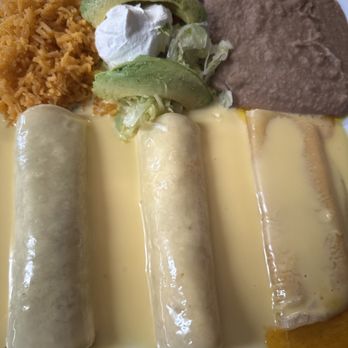 Jalapeno's Cuisine - Beef, shredded chicken, & queso quesadillas with refried beans. - Mexican Near Me - El Campo, Texas Jalapeno's Cuisine - Beef, shredded chicken, & queso quesadillas with refried beans. - Mexican Near Me - El Campo, Texas
