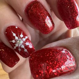 My Christmas nails by Kim. I've been using Kim over 12 years. She also does my Lashes. The staff there is so friendly and knowledgeable. My Christmas nails by Kim. I've been using Kim over 12 years. She also does my Lashes. The staff there is so friendly and knowledgeable.