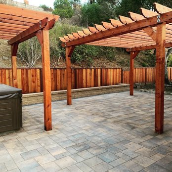 Atlas Pavers Co. - Finished patio, new low planter. New fence and pergolas were coordinated w/ help from Atlas - Masonry/Concrete Near Me