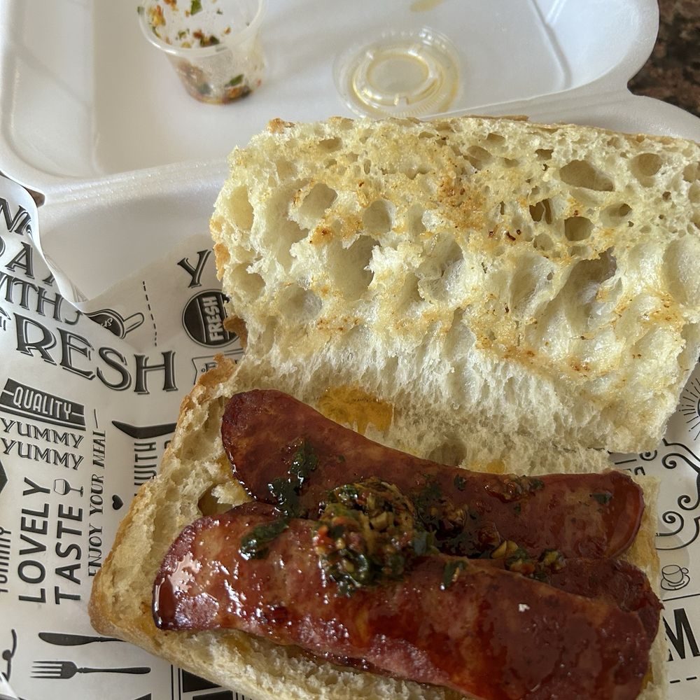 El Gaucho Deli Cafe - The chorizo might look huge there but they were flatter than the bread and the amount of chimichuri... - Peruvian Near Me - Estero, Florida El Gaucho Deli Cafe - The chorizo might look huge there but they were flatter than the bread and the amount of chimichuri... - Peruvian Near Me - Estero, Florida