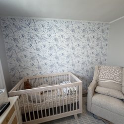 Wallpros - Wallpaper completed in a morning. They applied primer and the put up the peal and paste temporary paper. Looks great.