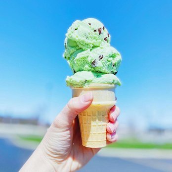 Toft's on 250 - a hand holding an ice cream cone - Ice Cream & Frozen Yogurt Near Me - Sandusky, Ohio Toft's on 250 - a hand holding an ice cream cone - Ice Cream & Frozen Yogurt Near Me - Sandusky, Ohio