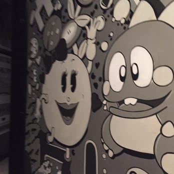 Cobra Arcade Bar - Love the art on the bathroom door - Bars Near Me - Phoenix, Arizona