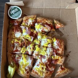 Papa Johns Pizza - Cold, tasteless, and a mess. This is how it was when I opened the box, tried a piece and that was it! Sorry PJ will not try again.