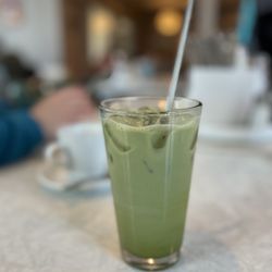 Mothership on Main - Iced Matcha with House made: Yucatán Syrup (cinnamon, anise, cardamom)