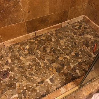 Aftermath Cleanup and Hauling - This is the pebble they did prior to them adding the grout. - Junk Removal & Hauling Near Me - Bakersfield, California Aftermath Cleanup and Hauling - This is the pebble they did prior to them adding the grout. - Junk Removal & Hauling Near Me - Bakersfield, California