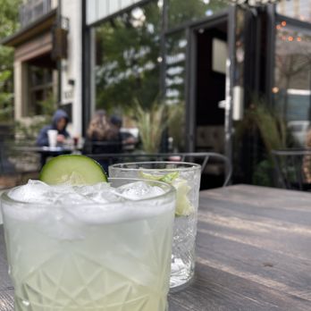 Dew Drop Inn - I'm on a Patio signature cocktail and a Svedka and soda behind it. - Gastropubs Near Me - Denver, Colorado