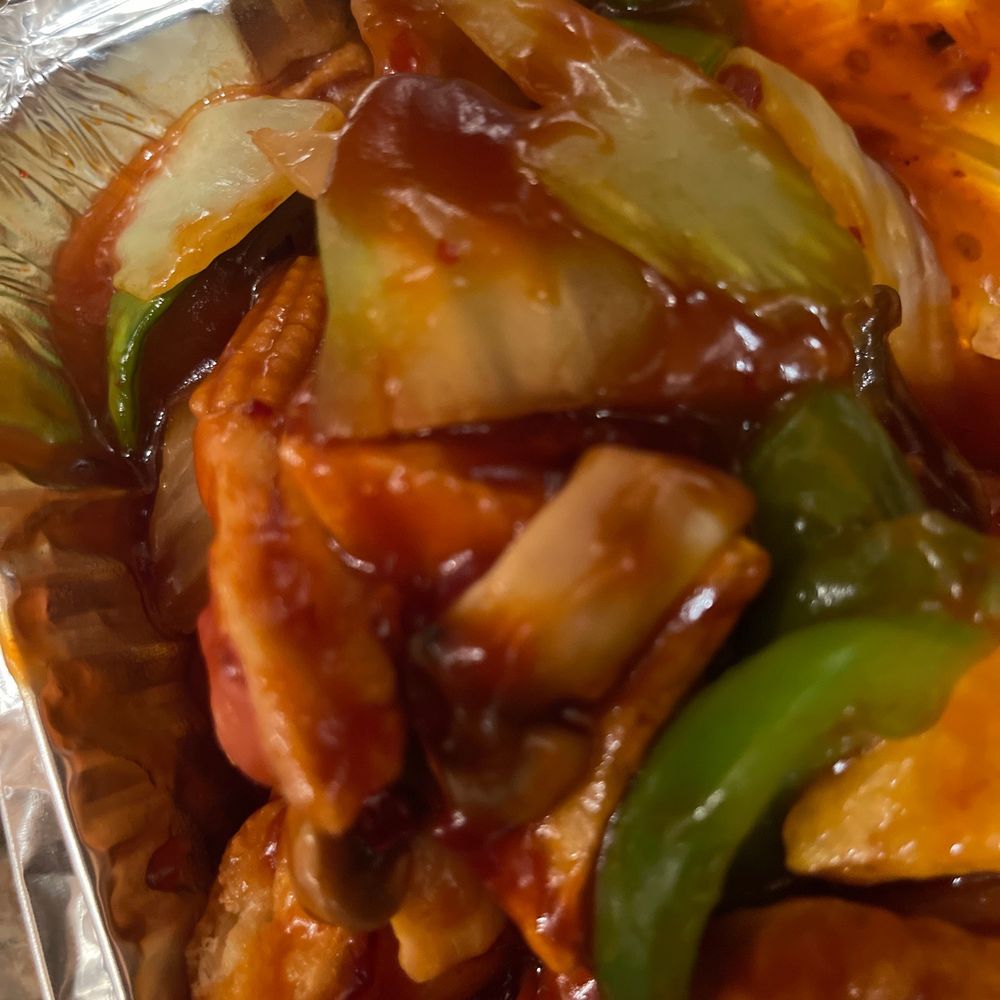 a plastic container filled with food a plastic container filled with food
