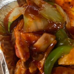 a plastic container filled with food a plastic container filled with food
