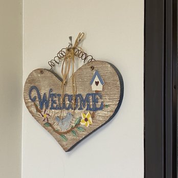 Allouez Cafe - a welcome sign hanging on a wall - Breakfast & Brunch Near Me - Green Bay, Wisconsin