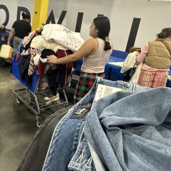 Goodwill - People are just taking all this clothes! It's $2.49  per pound! - Thrift Stores Near Me - Houston, Texas