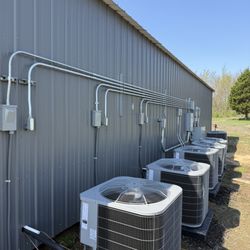 RedHawk Electric - 3 new A/C units and 3 new furnaces piped in and wired up.