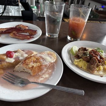 Egg - A tasty Bloody Mary, carnitas taco and a half order of French toast. And how can you not order bacon?! - Breakfast & Brunch Near Me - Saint Louis, Missouri