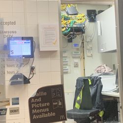 McDonald's - I think they need a new IT guy. What a mess to look at, poor employee to have to see that junked up mess everyday.
