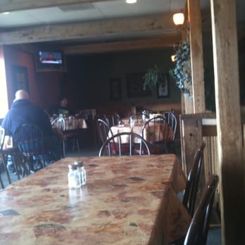 Hoagie's Deli - a dining room with tables and chairs - Delis Near Me - Pampa, Texas