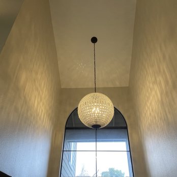 OC Electric - Five light, 26 pound crystal chandelier installed in foyer with 18' ceiling - Electricians Near Me OC Electric - Five light, 26 pound crystal chandelier installed in foyer with 18' ceiling - Electricians Near Me