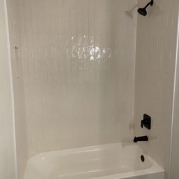 Tub installed and new fixtures added Tub installed and new fixtures added