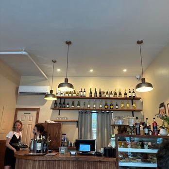 da Adriano - a woman standing at a counter in a restaurant - Salad Near Me - New York, New York